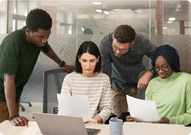 The Ace Biz team reviewing a client's figures together